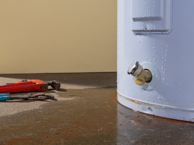 Why Is Water Heater Leaking From The Top? Clover Contracting